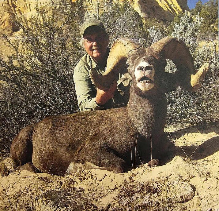 Larry Altimus poses with the desert bighorn ram he killed illegally in southwestern Utah. Altimus paid a high price for the hunting violation. The prominent Arizona guide is banned from hunting in 47 states for the next 10 years and paid more than $30,000 in restitution and fines. (Utah Division of Wildlife Resources)
