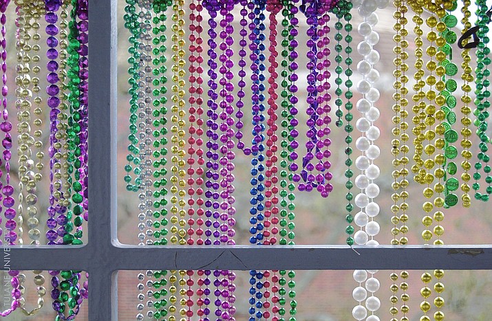 Mardi Gras Beads on a balcony (Tulane University)