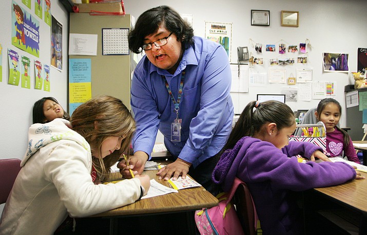 “I believe each one of my students who come through my door can and will succeed,” Says Delmundo Cepress, Johnson O’Malley Tutor at Camp Verde Elementary School. “I understand that each student is very unique in their own way, but that is what makes them special to me.” (Photo by Bill Helm)