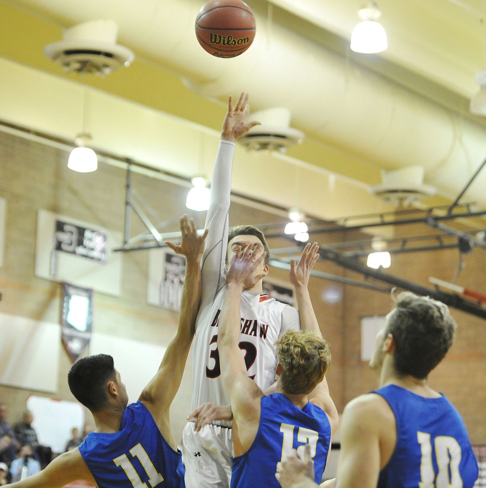 Bradshaw Mountain's Ben Petro goes high for a shot as the Bears hosted crosstown rival Prescott Tuesday night in Prescott Valley. (Les Stukenberg/Courier)