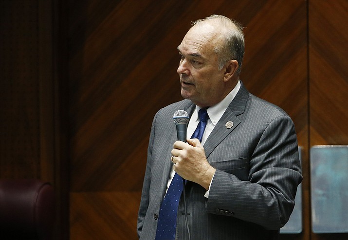 FILE - In this Tuesday, Jan. 9, 2018 file photo, Arizona state Rep. Don Shooter, R-Yuma, reads a statement regarding sexual harassment and other misconduct complaints made against him by Rep. Michelle Ugenti-Rita and others, on the House floor at the Capitol in Phoenix. An internal investigation released Tuesday, Jan. 30, 2018, found that Shooter violated the chamber's sexual harassment policies and has been permanently removed from all committee assignments. (AP Photo/Ross D. Franklin, File)

