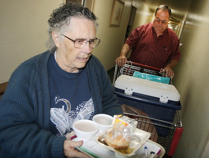 Marie DeClue and Ron Posten deliver meals to Camp Verde senior citizens twice each week. According to DeClue, the meal she and Posten deliver is for some people “the only food they get each day.”