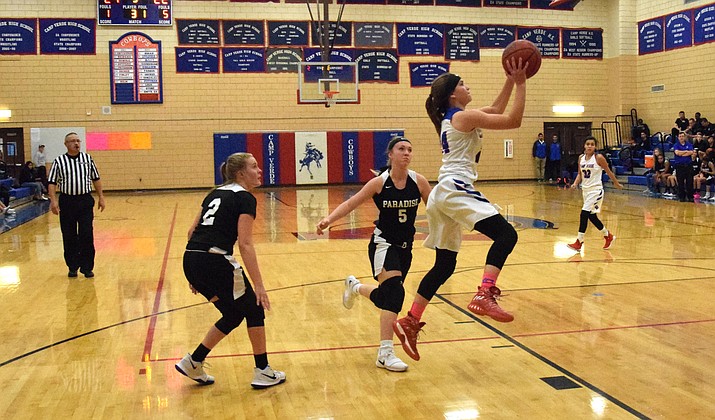 Camp Verde sophomore Tanna Decker takes a shot during the Cowboys’ 54-38 win over Paradise Honors at home on Tuesday. Decker scored  15 points and grabbed 10 rebounds, her first double double. (VVN/James Kelley)