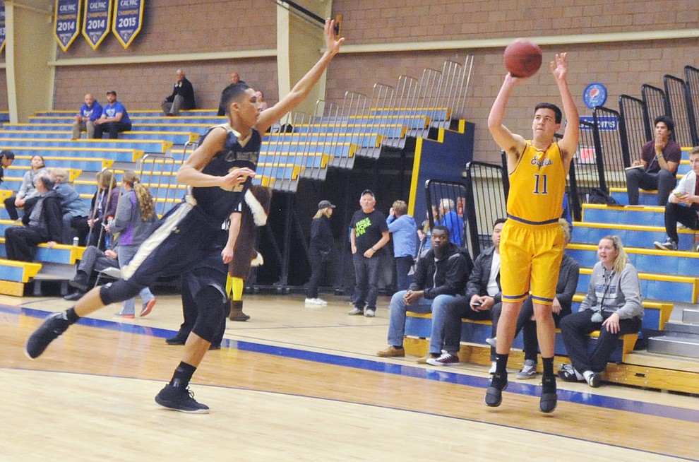 Embry Riddle's Jaran Hoover takes a 3-pointer as the Eagles hosted California Maritime Academy in Prescott Thursday evening. (Les Stukenberg/Courier)