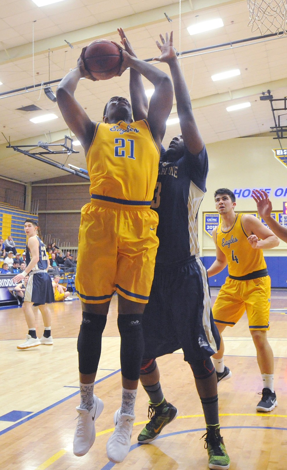 Embry Riddle's Joseph Jewell goes up hard as the Eagles hosted California Maritime Academy in Prescott Thursday evening. (Les Stukenberg/Courier)