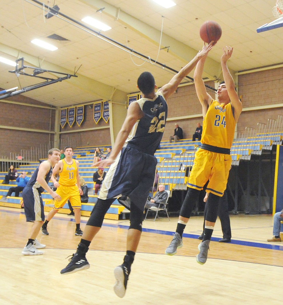 Embry Riddle's Gilbert Ibarra gets a shot off as the Eagles hosted California Maritime Academy in Prescott Thursday evening. (Les Stukenberg/Courier)