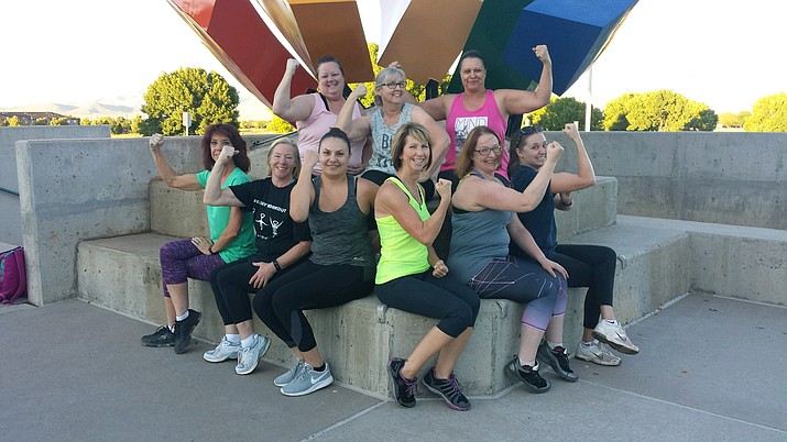 Katie Folsom-Nelson, center, is surrounded by “campers’ who participated in one of her sessions of Kickstart Bootcamp for Women in Prescott Valley. She said she enjoys the fitness business more than running her own maintenance company, despite the fluctuations that come with running the bootcamp.
(Courtesy)