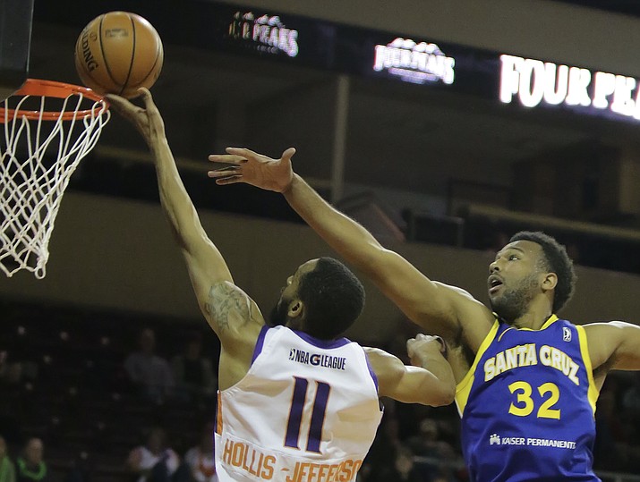 Northern Arizona's Rahlir Hollis-Jefferson (11) lays the ball over the rim as the Suns host Santa Cruz on Saturday, Feb. 3, 2018, in Prescott Valley. Hollis-Jefferson scored 23 points on 7 of 13 shooting from the field, was 7 of 11 from the free-throw line, grabbed six rebounds and had five steals in a 122-113 victory. (Matt Hinshaw/NAZ Suns)