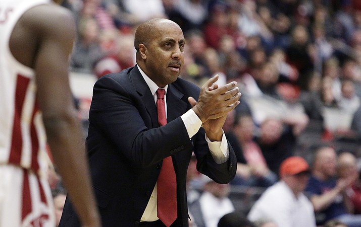 In this Wednesday, Jan. 31, 2018, file photo, Arizona associate head coach Lorenzo Romar reacts during the first half against Washington State in Pullman, Wash. He spent 15 seasons as the head coach at Washington, but now will walk into Huskies home gym as the opponent. (Young Kwak/AP, File)
