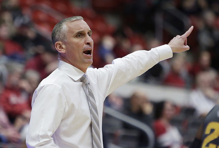 Arizona State University's men's basketball coach Bobby Hurley directs his team during Sunday's game against Washington State. The No. 25-ranked Sun Devils won. (Associated Press)