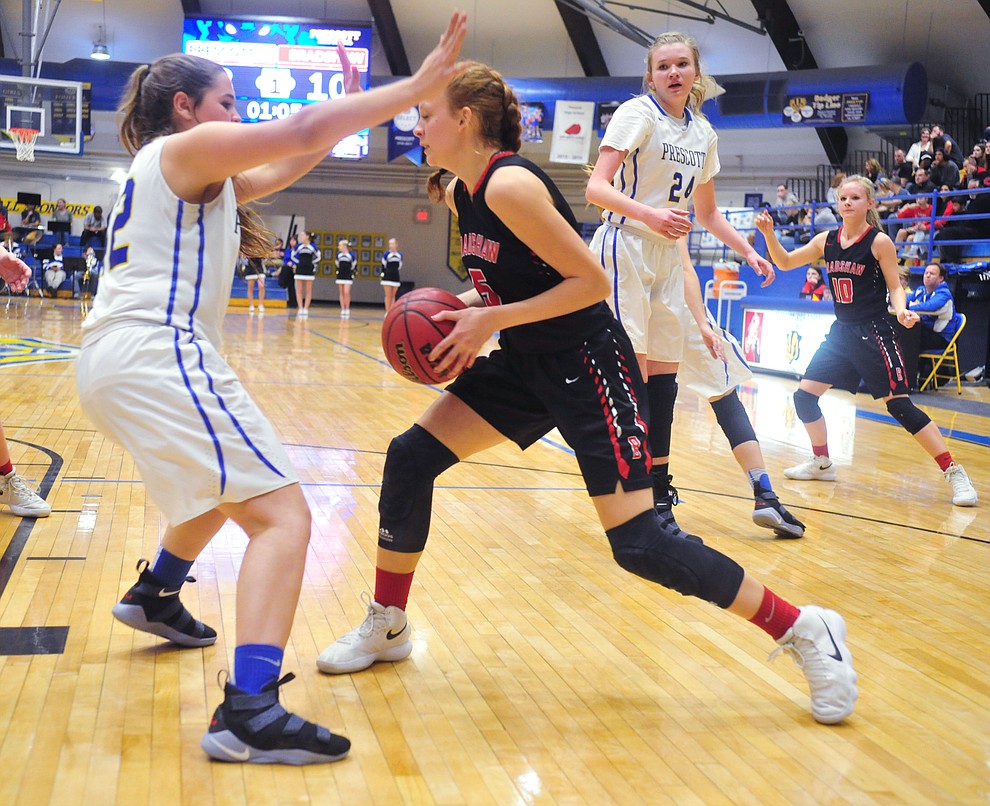 Bradshaw Mountain's Sierra Wooley looks to pass inside as the Bears traveled to crosstown rival Prescott for the regular season finale Tuesday night.  (Les Stukenberg/Courier)
