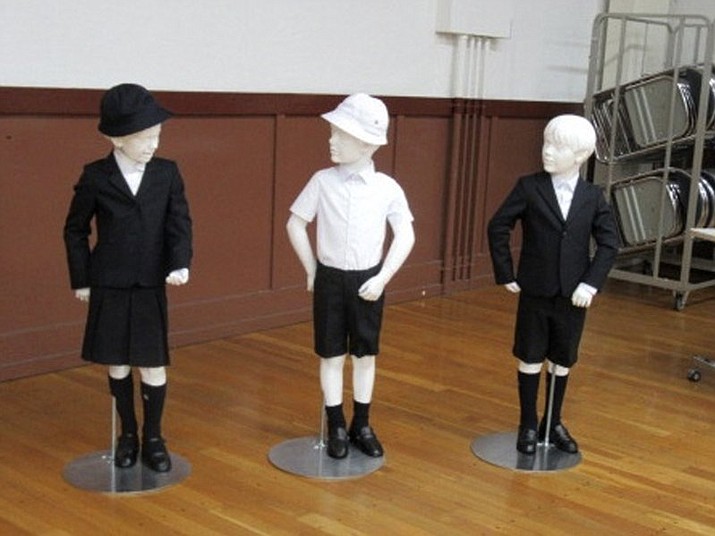This undated photo provided by Taimei Elementary School shows new school uniforms designed by Italian brand Armani. The Tokyo public school has adopted expensive Giorgio Armani uniforms for students, triggering criticism in a country where hefty school tuition is already burdening young parents.(Taimei Elementary School via AP)

