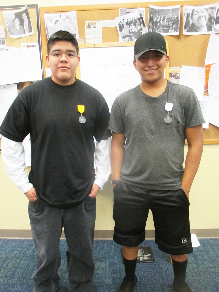 Hopi High wrestlers Mike Puhuyesva (left) and Dylan Morningstar wear the medals they won for at the regional meet. Stan Bindell