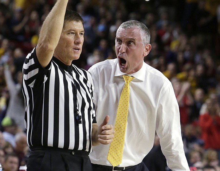 Arizona State coach Bobby Hurley talks to official Tony Padilla during the first half of the team's game against Arizona on Thursday, Feb. 15, 2018, in Tempe. (Rick Scuteri/AP)