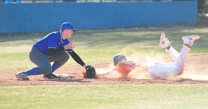 Chino Valley's Abdiel Sanchez gets thrown out at third as the Cougars play the Snowflake Lobos to open the 2018 baseball season Thursday afternoon in Chino Valley. (Les Stukenberg/Courier)