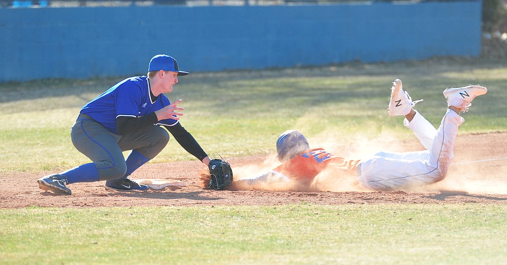 Chino Valley's Abdiel Sanchez gets thrown out at third as the Cougars play the Snowflake Lobos to open the 2018 baseball season Thursday afternoon in Chino Valley. (Les Stukenberg/Courier)