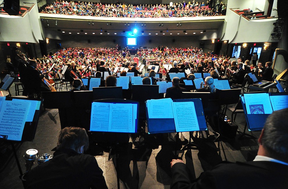 Students arrive before the Prescott Pops Symphony performs for 2200 third to fifth grade students from around Yavapai County in the annual Music Memory Concert at the Yavapai College Performance Hall Thursday morning. (Les Stukenberg/Courier)