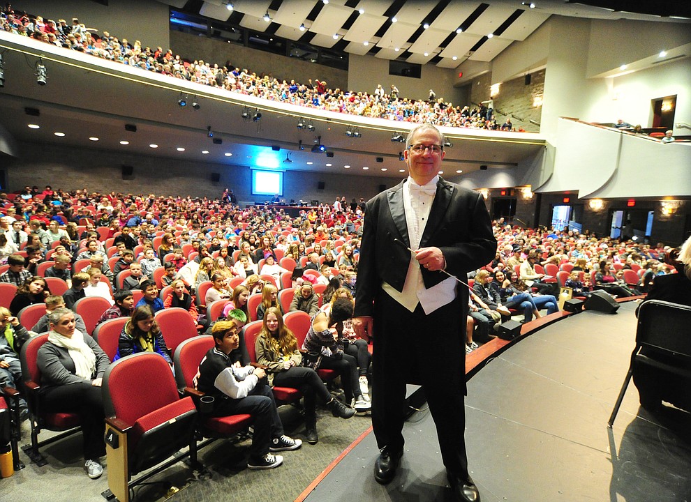 Conductor Joseph Place before the Prescott Pops Symphony performs for 2200 third to fifth grade students from around Yavapai County in the annual Music Memory Concert at the Yavapai College Performance Hall Thursday morning. (Les Stukenberg/Courier)