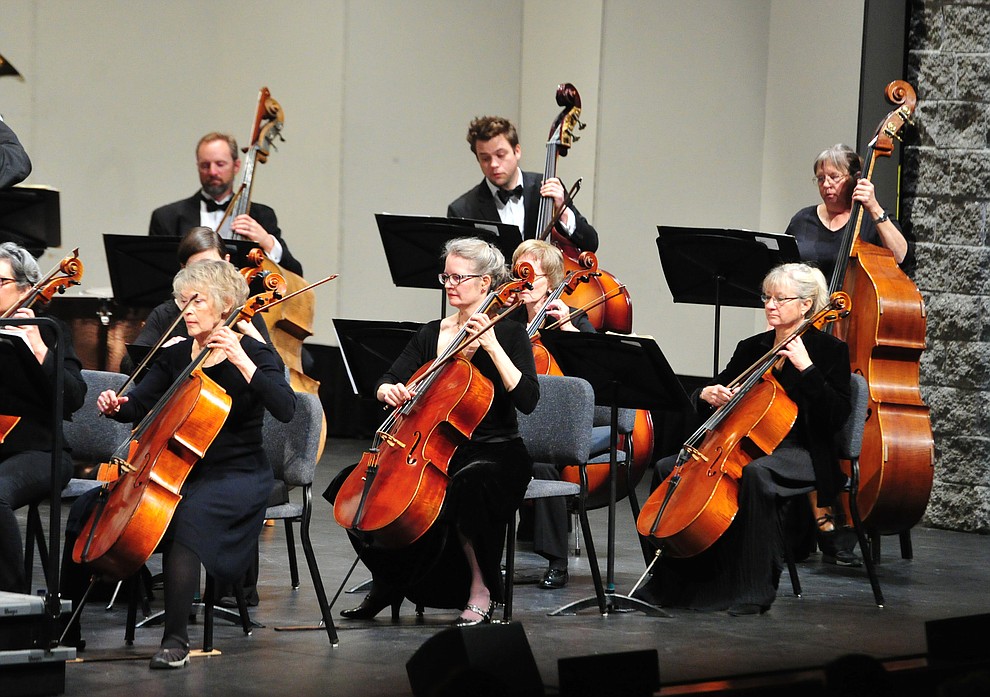 The Prescott Pops Symphony performs for 2200 third to fifth grade students from around Yavapai County in the annual Music Memory Concert at the Yavapai College Performance Hall Thursday morning. (Les Stukenberg/Courier)