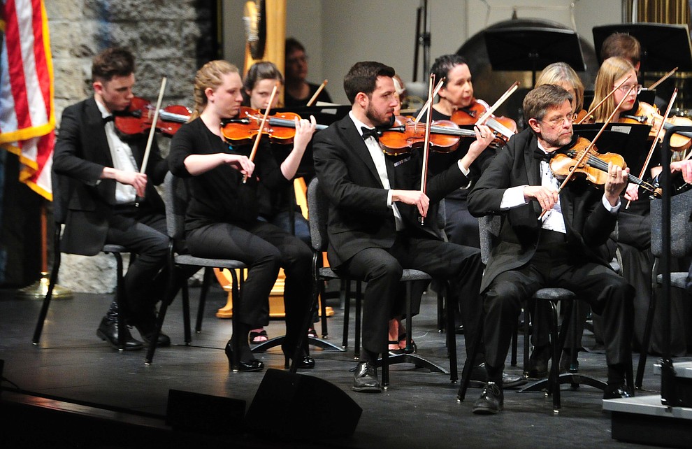 The Prescott Pops Symphony performs for 2200 third to fifth grade students from around Yavapai County in the annual Music Memory Concert at the Yavapai College Performance Hall Thursday morning. (Les Stukenberg/Courier)