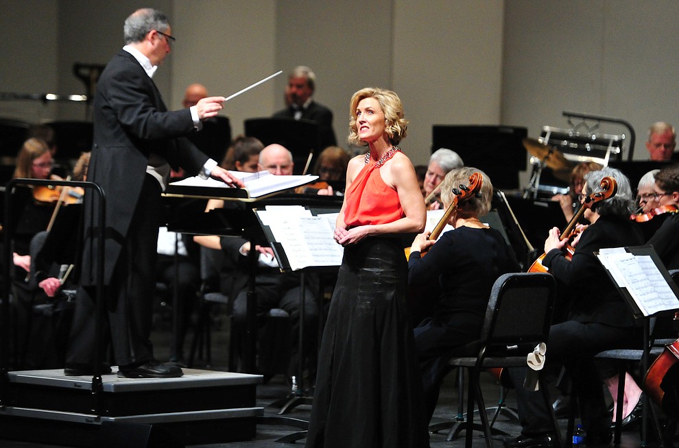 Arlene Hardy sings a song from Beauty and the Beast as the Prescott Pops Symphony performs for 2200 third to fifth grade students from around Yavapai County in the annual Music Memory Concert at the Yavapai College Performance Hall Thursday morning. (Les Stukenberg/Courier)