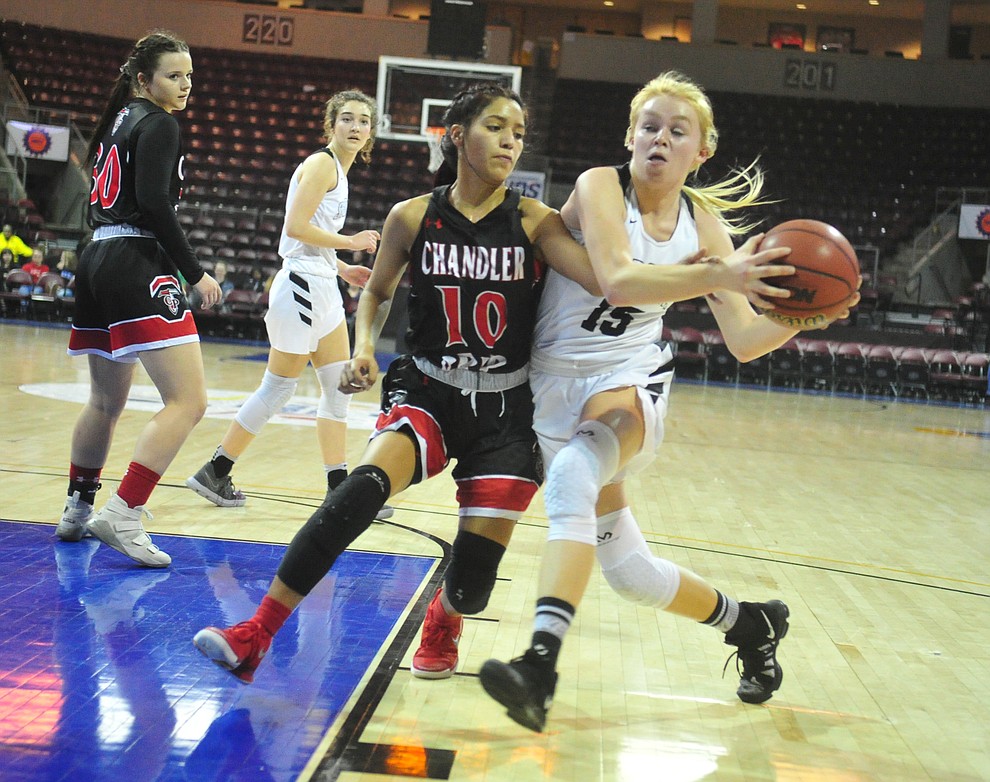 Sedona Red Rock's Jackie King (15) drives to the lane as the Scorpions play in the Arizona Interscholastic Association Division 2 semifinal against the Chandler Prep Titans Friday  at the Prescott Valley event Center. (Les Stukenberg/Courier)