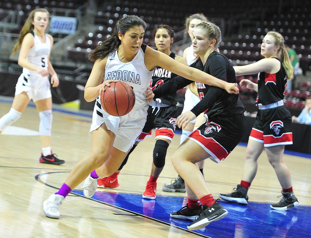 Sedona Red Rock's Brittany Medel (20) drives to the lane as the Scorpions play in the Arizona Interscholastic Association Division 2 semifinal against the Chandler Prep Titans Friday  at the Prescott Valley event Center. (Les Stukenberg/Courier)