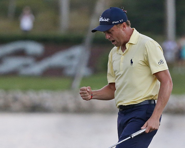 Justin Thomas celebrates after winning the Honda Classic golf tournament in a sudden-death playoff Sunday, Feb. 25, 2018 in Palm Beach Gardens, Fla. (Wilfredo Lee/AP)