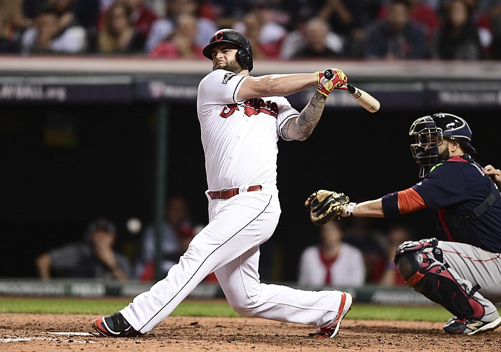 In this Oct. 6, 2016, file photo, Cleveland Indians’ Mike Napoli bats against the Boston Red Sox. The free agent slugger has agreed to a minor league contract with the team Tuesday, Feb. 27, 2018. (David Dermer/AP, File)