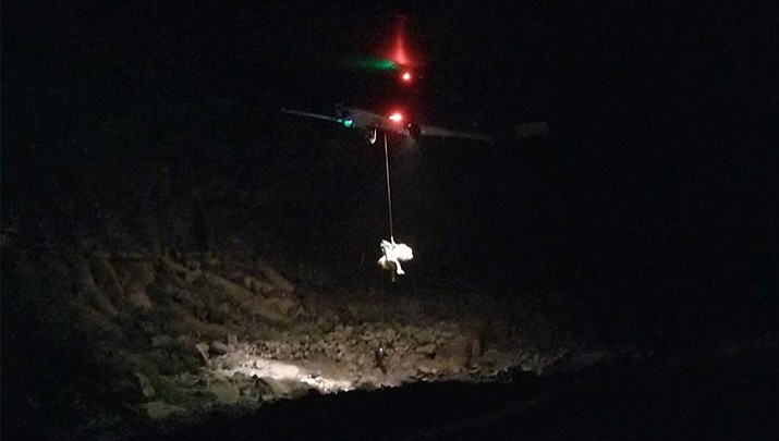 Mohave County Sheriff's Office Search and Rescue respond to a sightseeing helicopter crash in the Grand Canyon. The parents of a British tourist who died after the crash have filed the first wrongful death lawsuit related to the accident.  The Feb. 10, 2018 crash killed five people and critically injured two, including the pilot. (Mohave County Search and Rescue)
