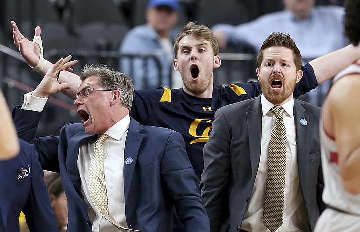 California’s bench reacts to a call during the first half of an NCAA college basketball game against Stanford in the first round of the Pac-12 men’s tournament Wednesday, March 7, 2018, in Las Vegas.