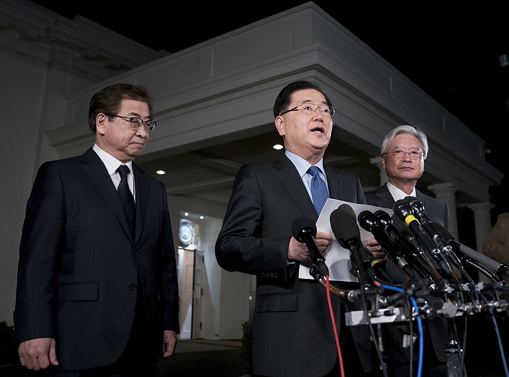 South Korean national security director Chung Eui-yong, center, speaks to reporters at the White House in Washington, Thursday, March 8, 2018, as intelligence chief Suh Hoon, left and Cho Yoon-je, the South Korea ambassador to United States, listen. President Donald Trump has accepted an offer of a summit from the North Korean leader and will meet with Kim Jong Un by May, Chung said in a remarkable turnaround in relations between two historic adversaries. (AP Photo/Andrew Harnik)

