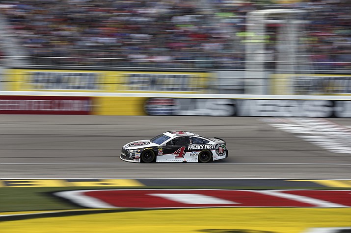 Kevin Harvick drives during a NASCAR Cup series auto race, Sunday, March 4, 2018, in Las Vegas. He was the subject of penalties for violations discovered after his win in Las Vegas. 