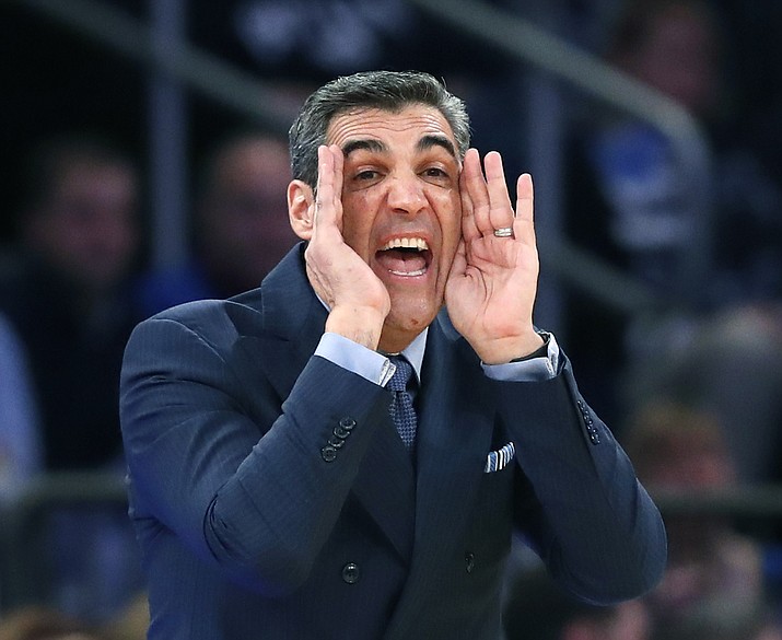 Villanova coach Jay Wright shouts to players at the other end of the court during the second half Thursday, March 8, 2018. (Kathy Willens/AP, File)