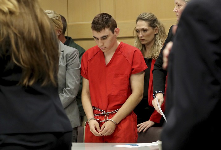 This Feb. 19, 2018 file photo shows Nikolas Cruz appearing in court for a status hearing before Broward Circuit Judge Elizabeth Scherer in Fort Lauderdale, Fla., Florida prosecutors announced Tuesday, March 13 that they will seek the death penalty against Cruz, a former student charged in the fatal shooting of 17 people at Marjory Stoneman Douglas High School last month. (Mike Stocker/South Florida Sun-Sentinel via AP, Pool, File)

