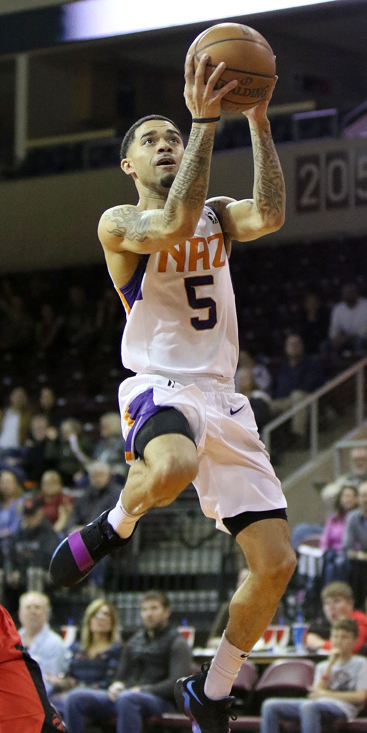 Northern Arizona Suns guard Josh Gray takes to the air for 2 points Friday night, March 16, 2018, against the Raptors 905 at the Prescott Valley Event Center.