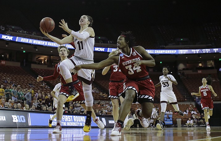 Arizona State guard Robbi Ryan (11) drives to the basket past Nebraska guard Jasmine Cincore (34) during a first-round game in the NCAA women’s college basketball tournament, Saturday, March 17, 2018, in Austin, Texas. (Eric Gay/AP)