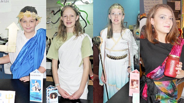 From Left, Aidan Haslam as Poseidon; Maddy Brandon as Medusa; Joie Wooster as Hera, queen of the gods; and Jamie Echard as Eris, goddess of strife and discord. They are among more than 120 sixth graders who each researched a Greek character of their choice and presented a monologue as their chosen character at Granite Mountain School’s annual Greek Gods & Goddesses Museum. Friday, Feb. 23, 2018. (PUSD/Courtesy)