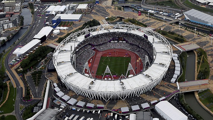 This Aug. 3, 2012, aerial file photo shows the Olympic Stadium at Olympic Park, in London. A person familiar with the plans tells The Associated Press that Major League Baseball is working to finalize a two-game series between the New York Yankees and Boston Red Sox at London’s Olympic Stadium on June 29-30 in 2019, the sport’s first regular-season games in Europe. The Red Sox have the option of having both games be Red Sox home games, the person familiar with the planning said. The person spoke on condition of anonymity Monday, March 19, 2018 because no announcement had been made. (Jeff J Mitchell/AP, File)
