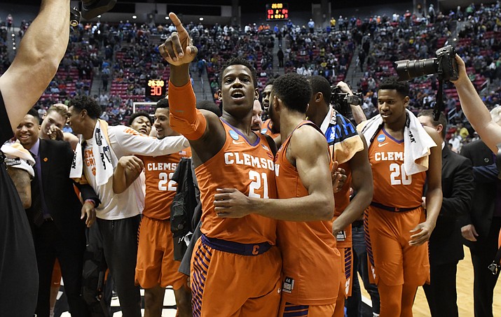 Clemson guard Anthony Oliver II (21) celebrates after Clemson defeated Auburn 84-53 in a second-round NCAA college basketball tournament game Sunday, March 18, 2018, in San Diego. (Denis Poroy/AP, File)