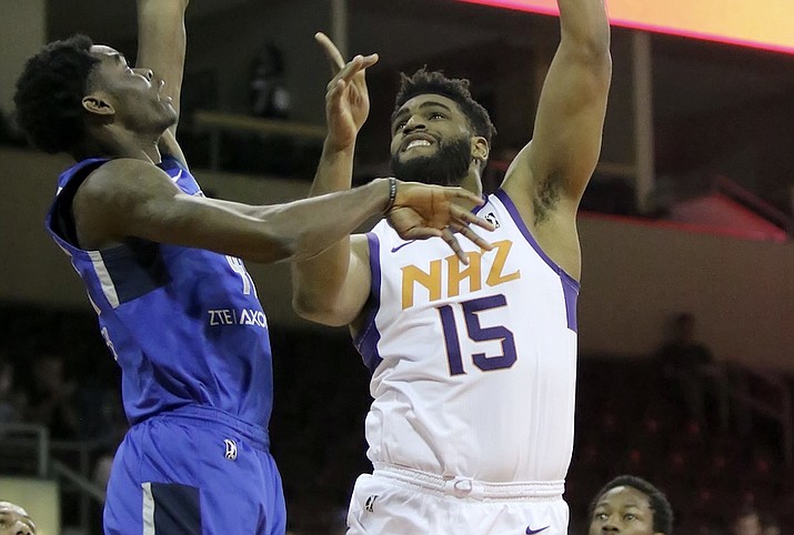 Northern Arizona's Alan Williams (15) goes hard to the basket against a Texas Legend defender Wednesday, March 21, 2018, in Prescott Valley. Williams made his return to the hardwood Wednesday after right knee surgery in September 2017 sidelined the Phoenix Suns' forward for most of the 2017-18 season. (Matt Hinshaw/NAZ Suns)