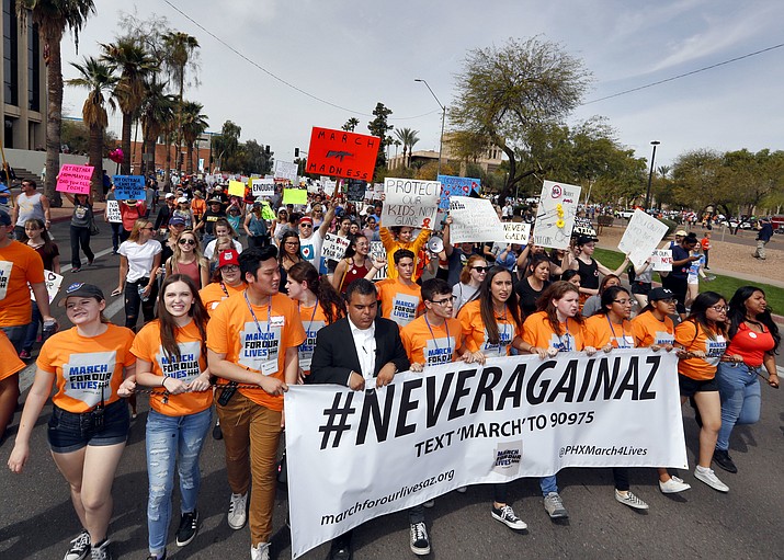 People participate in a March For Our Lives rally at the state Capitol on Saturday, March 24, 2018, in Phoenix. (Matt York/AP)