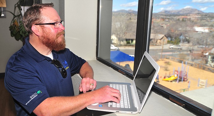 Superintendent Joe Howard is pictured in his new office as the Prescott Unified School District moved into its new home, in the historic Washington School buliding, Friday, March 23, 2018, in Prescott. (Les Stukenberg/Courier)