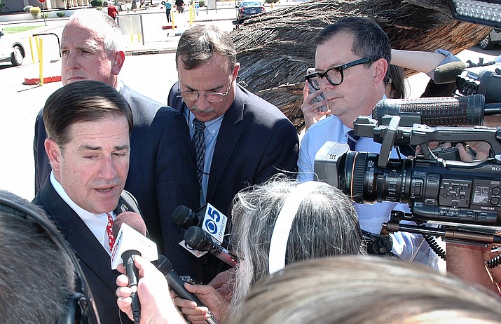 Gov. Doug Ducey answers questions Thursday, March 29, about his plans for K-12 funding as teachers weigh a strike. (Howard Fischer/Capitol Media Services)