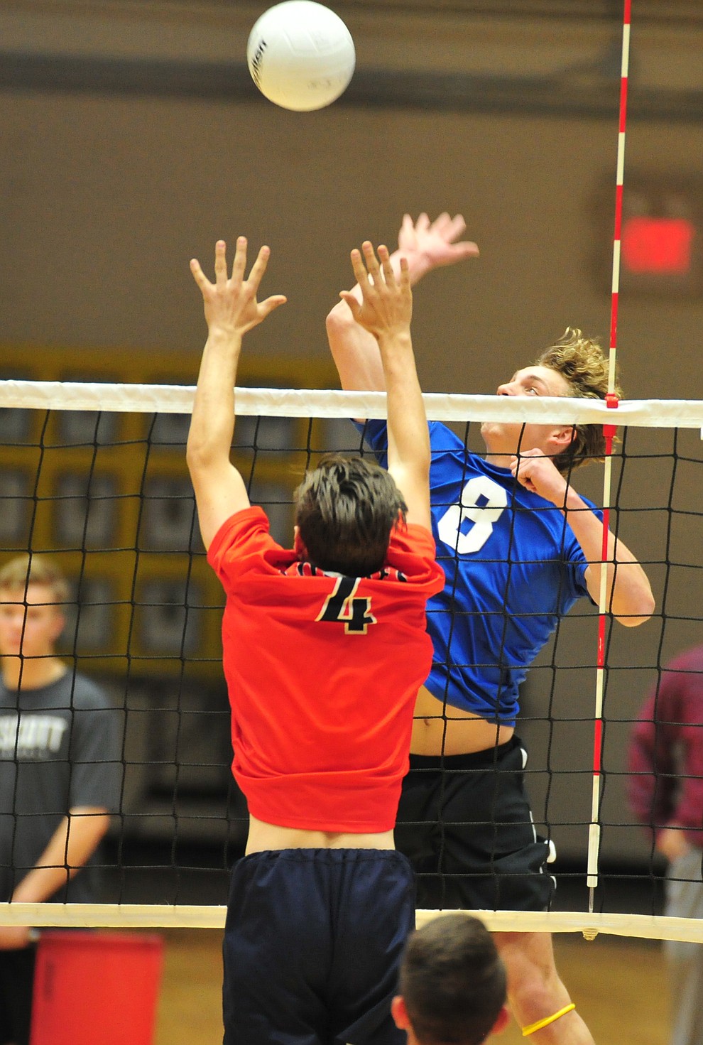 Prescott's Dallin Jex goes for a cross court slam as the Badgers hosted Centennial High School in a volleyball matchup Tuesday, April 3, 2018. (Les Stukenberg/Courier)