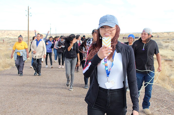Hopi High media student Serena Leslie takes a selfie during the RISE march at Hopi Jr/Sr High. (Stan Bindell/NHO)