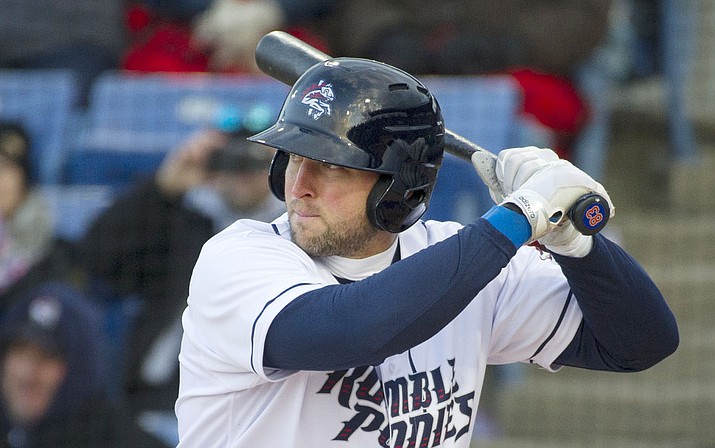 Tim Tebow, playing for the Binghamton Ruble Ponies, prepares to bat in the first inning of his debut with the team, against the Portland Sea Dogs in a Double-A baseball game Thursday, April 5, 2018, in Binghamton, N.Y. (AP Photo/Matt Smith)

