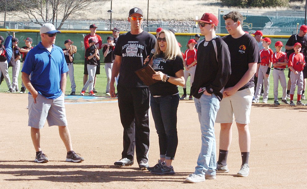 Deanna Eder speaks after being honored with the Bill Vallely Award during opening ceremonies for the 2018 Prescott Little League Saturday, April 7, 2018 at Bill Vallely Field in Prescott. (Les Stukenberg/Courier)