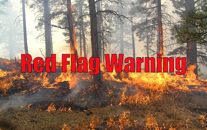 The National Weather Service has issued a red flag warning due to critical fire spreading conditions.