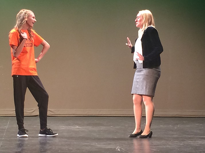 Legally Blonde: Brooke Wyndham (Shelby Snow) talks to Elle Woods (Amanda Hugeri) about an alibi for her defense in Prescott High School’s production of “Legally Blonde” at Prescott High School’s Ruth Street Theatre. Showtimes are Thursday-Saturday, April 12-14. (Jason Wheeler/Courier)